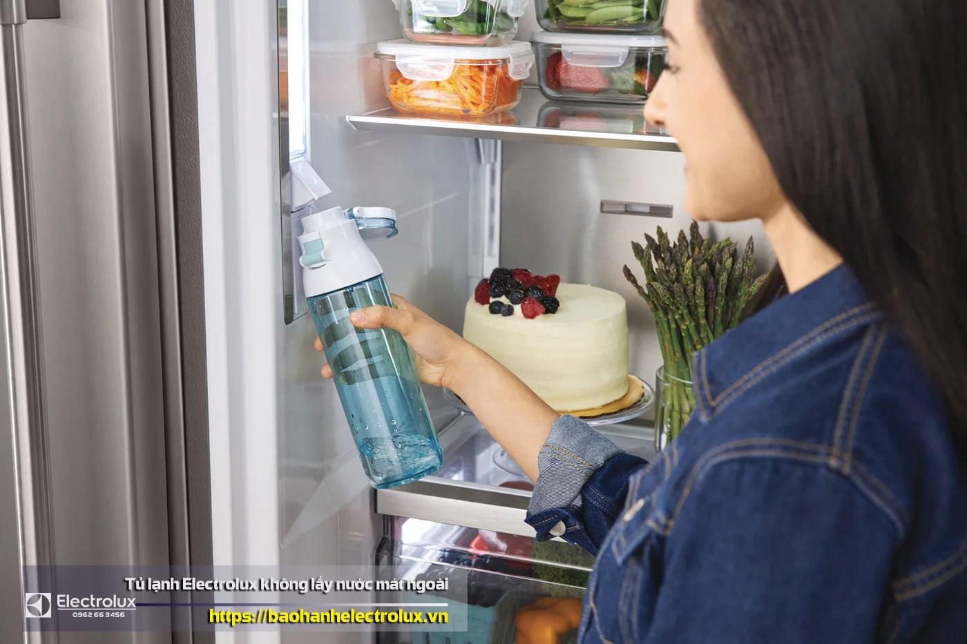 Water filter replacement in Electrolux refrigerator, woman refilling water, fridge water dispenser, fresh water inside refrigerator, water purification process for Samsung fridge.