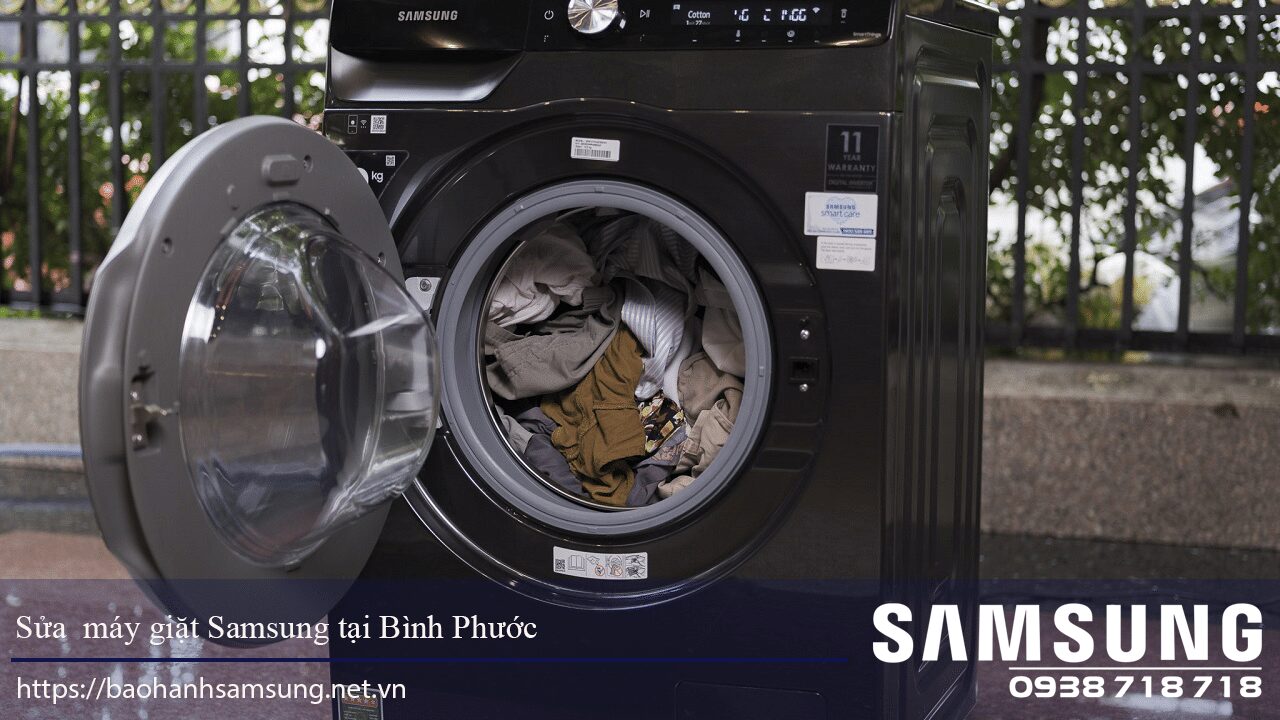 Clothes inside a Samsung washing machine at Binh Phuoc for repair or maintenance services.